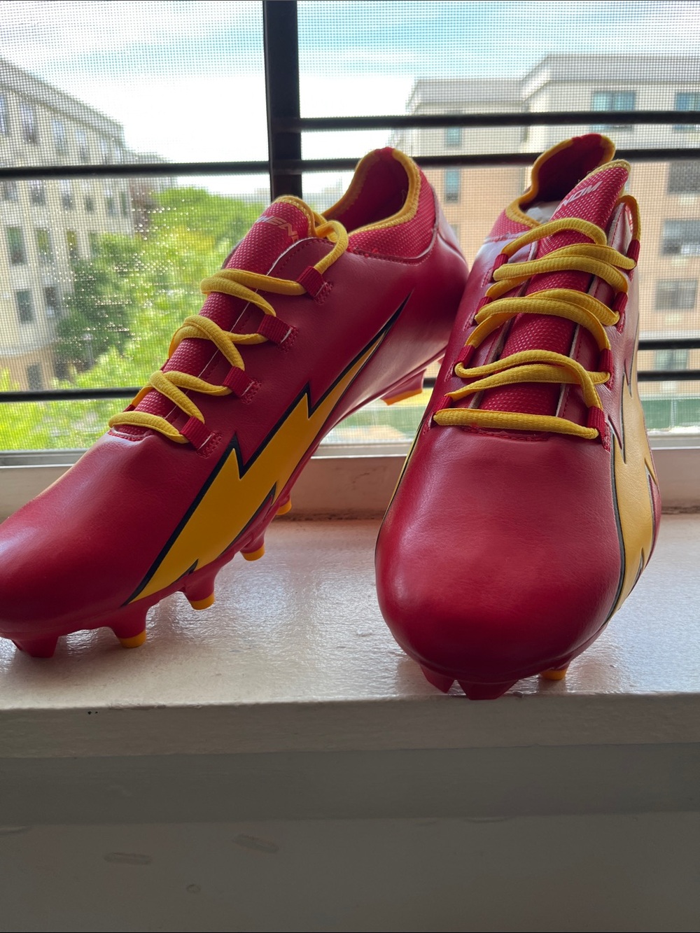 Red and Yellow Lightning Soccer Cleats